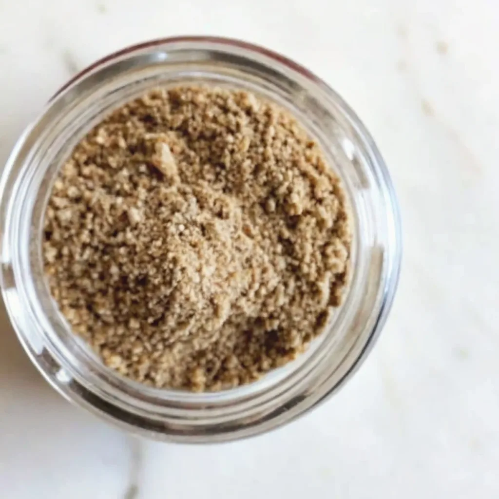Bariatric Seed Drink Recipe: A Dietitian's Guide to the Viral Trend bariatric seed drink recipe An overhead view of a glass jar filled with the finished bariatric seed mix powder, ready for making the bariatric seed drink recipe.