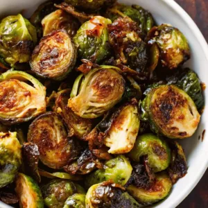 Crispy honey balsamic brussels sprouts in white bowl