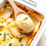 Baked Mashed Potatoes Recipe That’s Creamy, Crispy & Comforting Baked Mashed Potatoes Spoonful of baked mashed potatoes with herbs