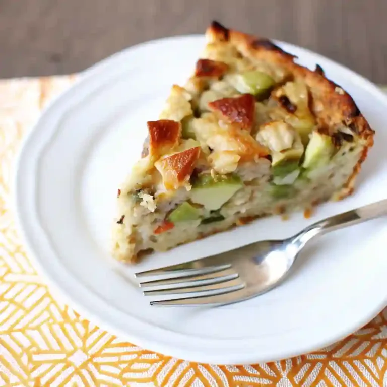 Vegan Thanksgiving Pot Pie | Best Holiday Vegan Recipes Gluten Free Pumpkin Muffins Close up of a slice of Vegan Thanksgiving Pot Pie on a white plate with fork