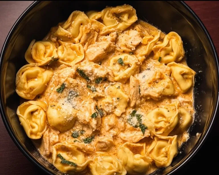 CrockPot Chicken Tortellini Broccoli Cheddar Soup A delicious bowl of CrockPot Chicken Tortellini with herbs and cheese