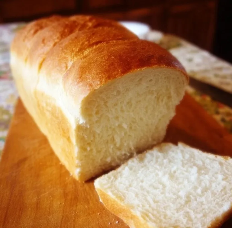 Amish White Bread: A Timeless Classic gnocchi Freshly baked Amish White Bread loaves on a wooden table