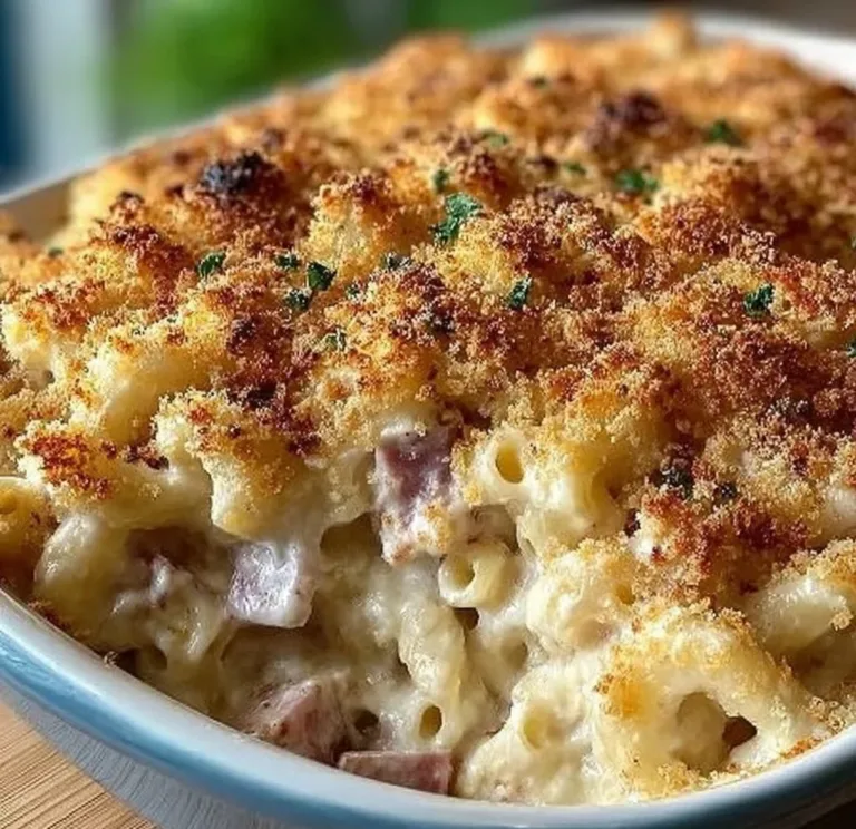 Delicious Chicken Cordon Bleu Casserole topped with cheese and herbs