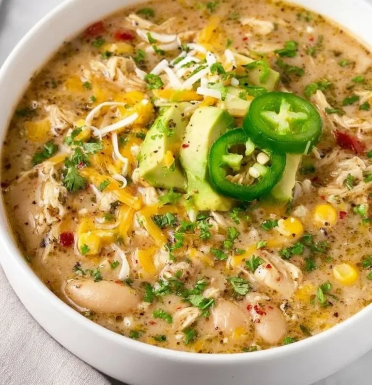 Gluten-Free White Bean Turkey Chili Garlic Parmesan Chicken Bowl of gluten-free white bean turkey chili topped with fresh herbs