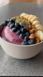 High protein breakfast smoothie bowl with fruits and toppings