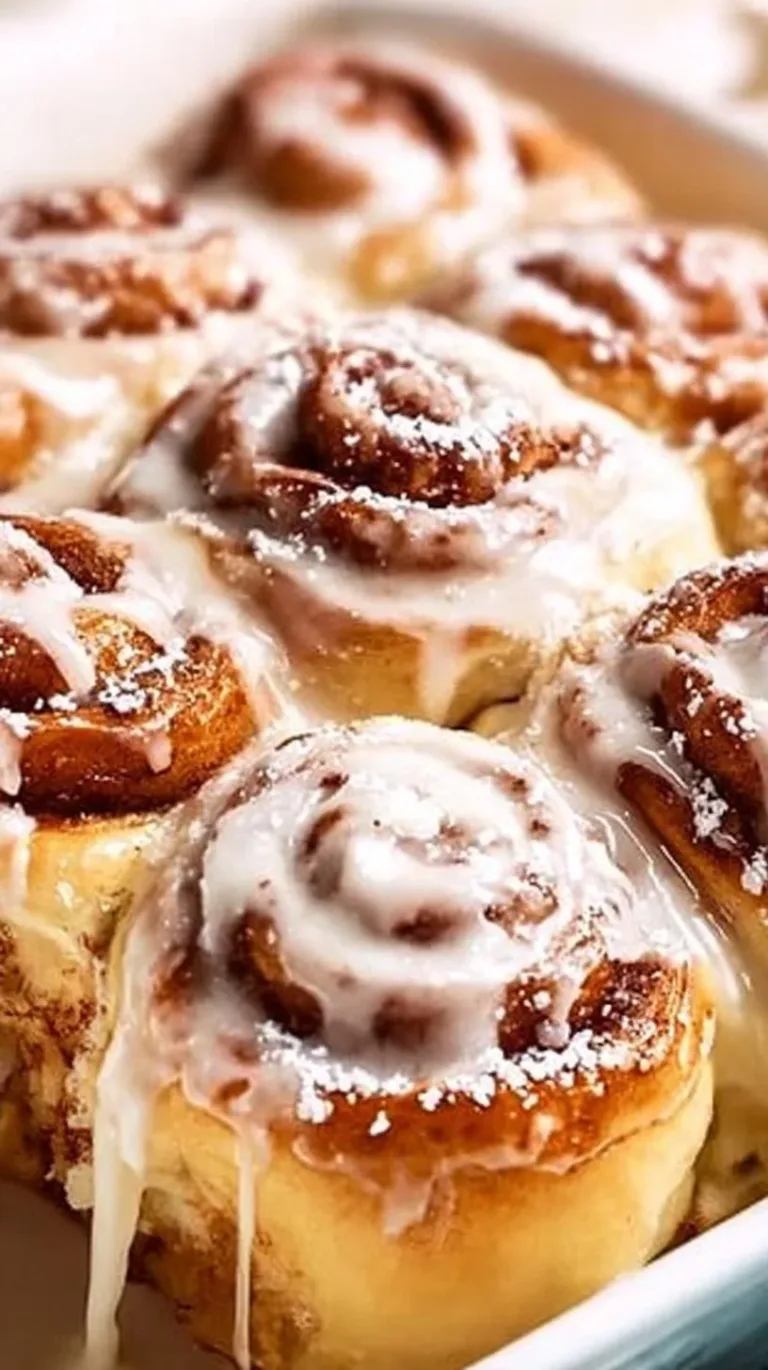 Ultimate Homemade Cinnamon Rolls cinnamon rolls Freshly baked ultimate homemade cinnamon rolls topped with cream cheese icing