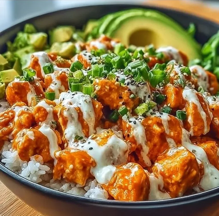 Delicious Buffalo Chicken Bowl with vibrant toppings and a drizzle of sauce