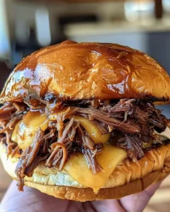 Delicious pulled beef sandwich with tender beef and fresh toppings