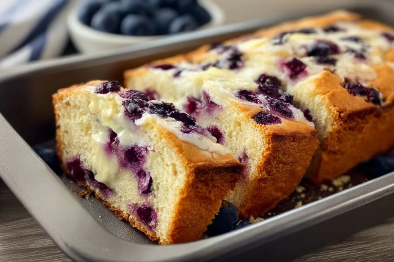 Delicious blueberry cream cheese bread loaf with fresh blueberries on top